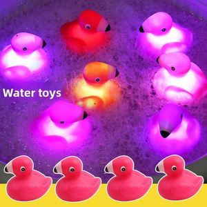 Hot Sale Summer Baby <b>Bathing</b> Flamingo Flashing Touch Sensing Luminous Floating Toy with Plastic Material for 0-24 Months - Product Image 1
