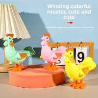 Coq coloré à ressort avec mécanisme d'enroulement - Jouet pour enfants en forme de poussin sauteur