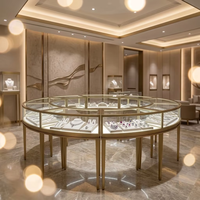 LED-Schmuckvitrinen Maßgefertigte Runde Mehrseitige Insel-Schmuckvitrine, Metallrahmen-Glasvitrine für Diamantenläden
