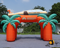 Arche gonflable géante personnalisée en forme de palmier tropical et d'avion pour les expositions, les spectacles et les événements promotionnels