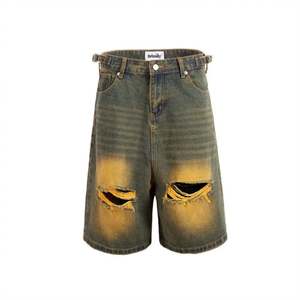 Shorts en jean vintage déchirés teints à la boue jaune, respirants, couleur contrastée personnalisée, tendance punk pour hommes - Product Image 1
