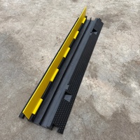 Tapón de Goma de 2 Canales con Tapa de PE, Negro, 100x24cm, Zhejiang, para Protección de Cables, Superventas
