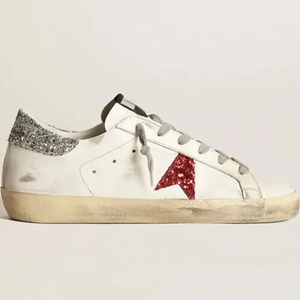 Chaussures décontractées GGBD Designer en cuir véritable, marque de luxe, avec logo doré et décoration étoile, style marche GGBD - Product Image 1