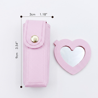 Étui à rouge à lèvres portable en cuir PU avec miroir compact en forme de cœur et porte-clés