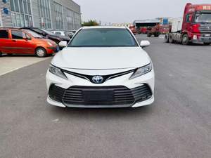 Toyota Camry LE Hybride Euro V d'occasion 2024, 50 000 à 75 000 miles, automatique, transmission intégrale, toit ouvrant panoramique, sièges en cuir, pneus R18, conduite à gauche - Product Image 1