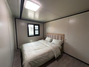 บ้านคอนเทนเนอร์สำเร็จรูปขนาด 30 ฟุต หรูหรา แบบแผงแซนวิช ขยายได้ 2 ห้องนอน พับเก็บได้ ทันสมัย เหมาะสำหรับใช้เป็นสำนักงานหรือที่อยู่อาศัย - Product Image 6