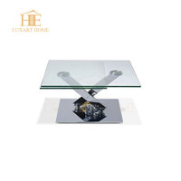 2025 vente chaude table basse élégante mécanique à engrenages en acier inoxydable avec table centrale en verre trempé transparent