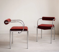 Chaise de salle à manger vintage Bauhaus, structure en acier inoxydable poli, dossier enroulé en velours, fauteuil écologique et durable pour la maison et les restaurants