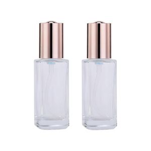 Botella de Perfume de Vidrio Grueso Transparente de 50 ml, con Fondo Plano, Tapa Plateada Mate, Pulverizador con Bomba, Impresión de Pantalla y Logotipo Personalizado, OEM de Lujo - Product Image 1