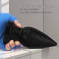 Plug anal en silicone noir surdimensionné avec ventouse, pointe pointue, design épais de la taille d'un poing pour l'entrée postérieure, jouet sexuel