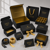 Boîte cadeau magnétique noire et or de luxe avec insert personnalisé pour chocolats, thé, bougies, miel et bijoux