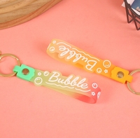 Porte-clés en caoutchouc souple PVC, Porte-clés en silicone, Lanière changeante de couleur, Bouteille de sable mouvant, Petit cadeau pendentif