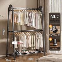 Porte-manteau mural de qualité supérieure pour la vente au détail, finition mate noire, construction en tube d'acier thermolaqué, support pour vêtements et objets décoratifs