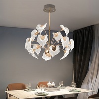 Lustre en cristal circulaire à double couche en forme de feuille de pin, avec traitement de surface doré et design moderne