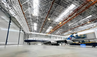 Hangar d'avion préfabriqué sur mesure à grande portée, design moderne, structure en acier préfabriquée