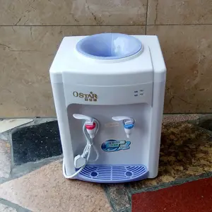 Dispenser di raffreddamento per acqua calda e fredda a caricamento dall'alto per uso domestico di piccole dimensioni Dispenser di acqua elettrica per bottiglie da 5 galloni