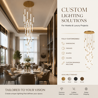 Lustre unique en acrylique à tube long, cylindre vertical multi-brins pour l'éclairage de projets d'hôtels, escaliers et plafonds hauts