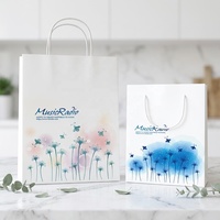 Sac de shopping en papier de luxe personnalisé avec logo imprimé, cordon de serrage et poignée, fabriqué par un fabricant à prix abordable