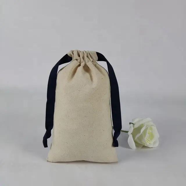 Promosyon geri dönüşümlü küçük ipli çanta düz organik pamuk özel Logo Muslin özel pamuk kanvas İpli çanta