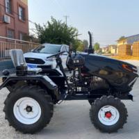 Mini-tracteur compact de 15 CV avec chargeur et pelle rétrocaveuse
