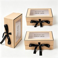Boîte cadeau magnétique en gros avec fenêtre transparente, ruban et nœud, boîte rigide de luxe en papier pour emballage de cadeaux, cosmétiques et vêtements de détail