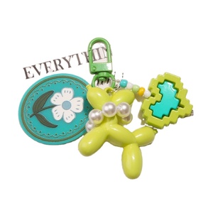 Nuevo Llavero Colgante de Perro de Burbujas con Patrón de Color Sólido de Acrílico de Dibujos Animados, Accesorio Creativo de Bloques de Construcción con Doble Corazón para Auriculares - Product Image 1