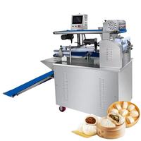 Machine à faire des mommo/baozi entièrement automatique Yifeng, grande capacité, capacité de 3600 unités/heure, multi-tension, pour les mommo/baozi.