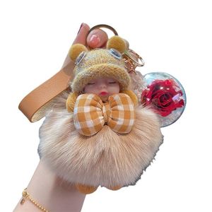 New Design 13cm Mini Soft Plush Baby Dolls <b>Key</b> <b>Chain</b> Fashion Vinyl Baby Face Dolls Keyring With Bow - Product Image 1