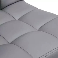 Chaise de bar pivotante moderne de luxe avec accoudoirs et repose-pieds, en cuir PU et tissu, avec base en métal