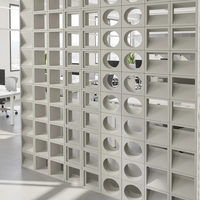 Blocs de ciment perforés à motif circulaire, parpaings, grilles en béton préfabriqué, briques perforées, façades ventilées