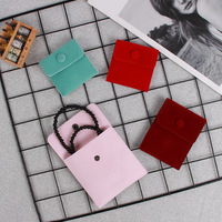 Tongxing Vente en gros Sacs à bijoux avec logo personnalisé Sacs en cuir et velours Colliers Emballage de stockage de bijoux Pochette à bijoux à boucle