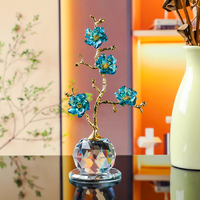Ornamen bunga kristal dianyam tangan dengan bunga kristal polihedral, dilapisi batang berlapis emas, dan merupakan karya seni bunga.