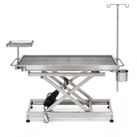 Table d'opération vétérinaire XY ACS07 avec inclinaison latérale unilatérale, réglage électrique de la hauteur et plateau en acier inoxydable