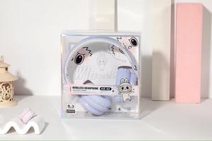 Must - See pour les fans de gentillesse! Oreillette Bluetooth de style beignet en peluche Labubu, commencez un voyage d'écoute adorable - Product Image 3