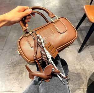 Porte-clés vintage Instagram avec chien teckel suspendu, en corde tressée, pour sac, et pendentif de baseball en cuir de niche - Product Image 5