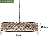 Luminaire suspendu rond en cristal à 8 lumières avec cadre en métal noir pour salle à manger, îlot de cuisine