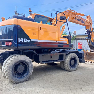 Excavatrices sur pneus Hyundai R140W d'occasion à vendre 90% Nouveau bon marché et en bon état avec moteur central et composants de moteur - Product Image 6
