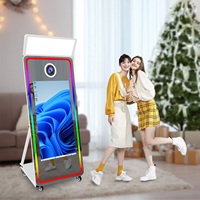 Máquina de cabina de fotos de espejo mágico de moda con cámara de pantalla táctil de 43 pulgadas e impresora cabina de espejo de fotos para boda