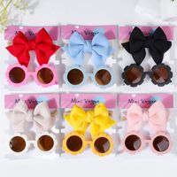 Ensemble d'accessoires pour cheveux pour bébés et tout-petits : Lunettes de soleil anti-UV mignonnes en forme de fleur et bandeau à nœud papillon
