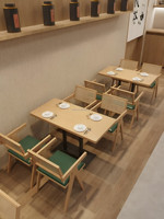Orientalischer Massivholz Runder Esstisch Geflochtener Rattan X-Rahmen Grüner PU-Sessel Zen-Tee Café Restaurant Möbel Großhandel