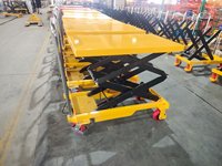 Depo fabrika yükleme ve bakım için 500kg elektrikli makaslı kaldırma tablası hidrolik mobil Platform kamyon