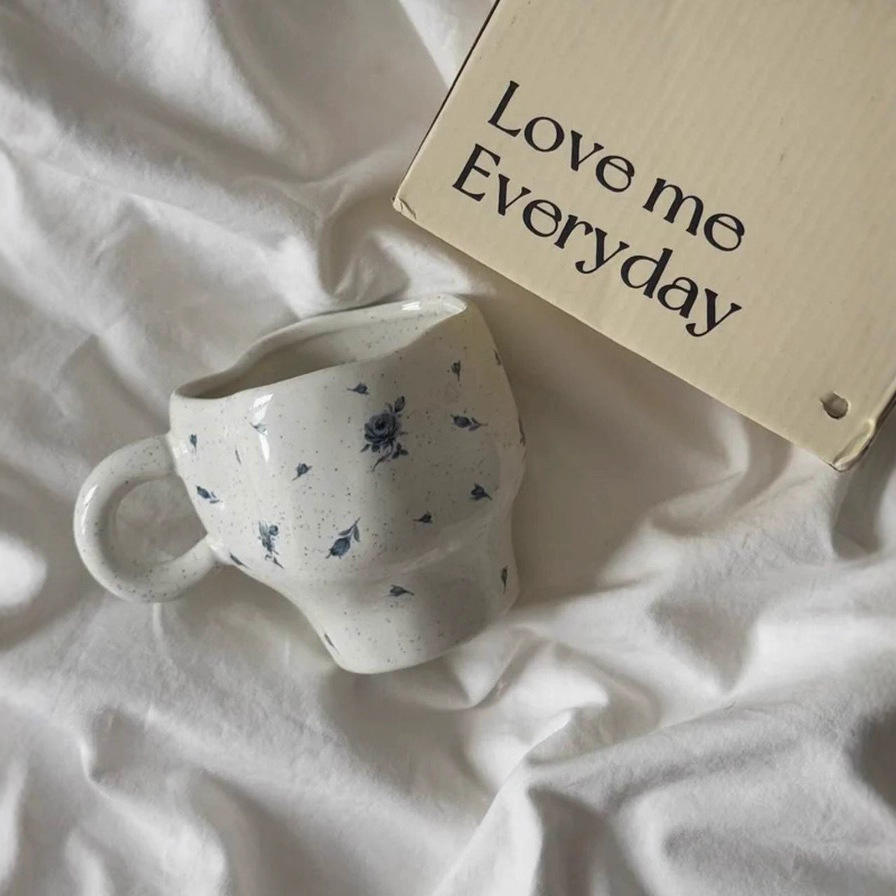 Blue rose, white cup