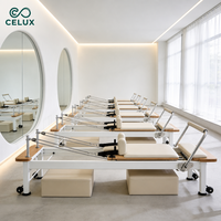 Machine de Pilates haut de gamme de luxe avec couleurs assorties pour le marché australien et américain, lit de Pilates à glisse silencieuse du fabricant