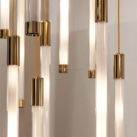 Lustre unique en acrylique à tube long, cylindre vertical multi-brins pour l'éclairage de projets d'hôtels, escaliers et plafonds hauts