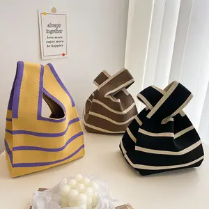 Bolso de hombro con diseño de rayas a la moda a precio de fábrica de Japón y Corea, bolso de punto de ganchillo tejido de lana para mujer