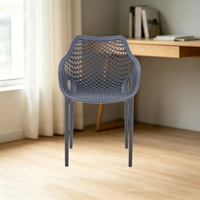 Chaise d'hôtel en plastique en gros, siège fixe moderne pour lieux publics, fauteuil ajouré jaune empilable pour patio, jardin et extérieur