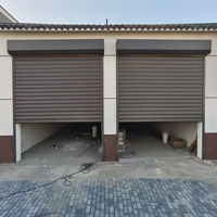 Portes enroulables en acier de conception industrielle sur mesure avec isolation thermique, résistantes au vent, durables pour une utilisation commerciale dans les centres commerciaux