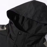 Blouson Bomber Homme à Capuche Camouflage et Patchwork, Coupe Ample, Zippé, Imperméable, Respirant, Réversible, Coupe-Vent, Décontracté