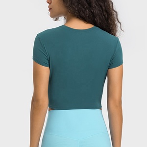 Ingrosso Tee corte Plain T-Shirt alla rinfusa estiva abbigliamento sportivo High Street allenamento o-neck taglio cucire T-Shirt <span class=keywords><strong>Crop</strong></span> top per le donne - Product Image 5