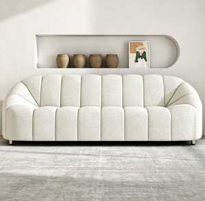 Canapé moderne en tissu bouclé trois places avec dossier capitonné incurvé et pieds en métal pour salon - Product Image 1